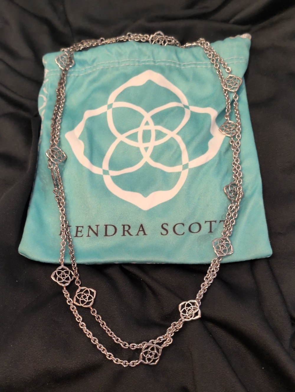 Kendra Scott Silver Necklace with Floral-Link Accents and Turquoise Pouch